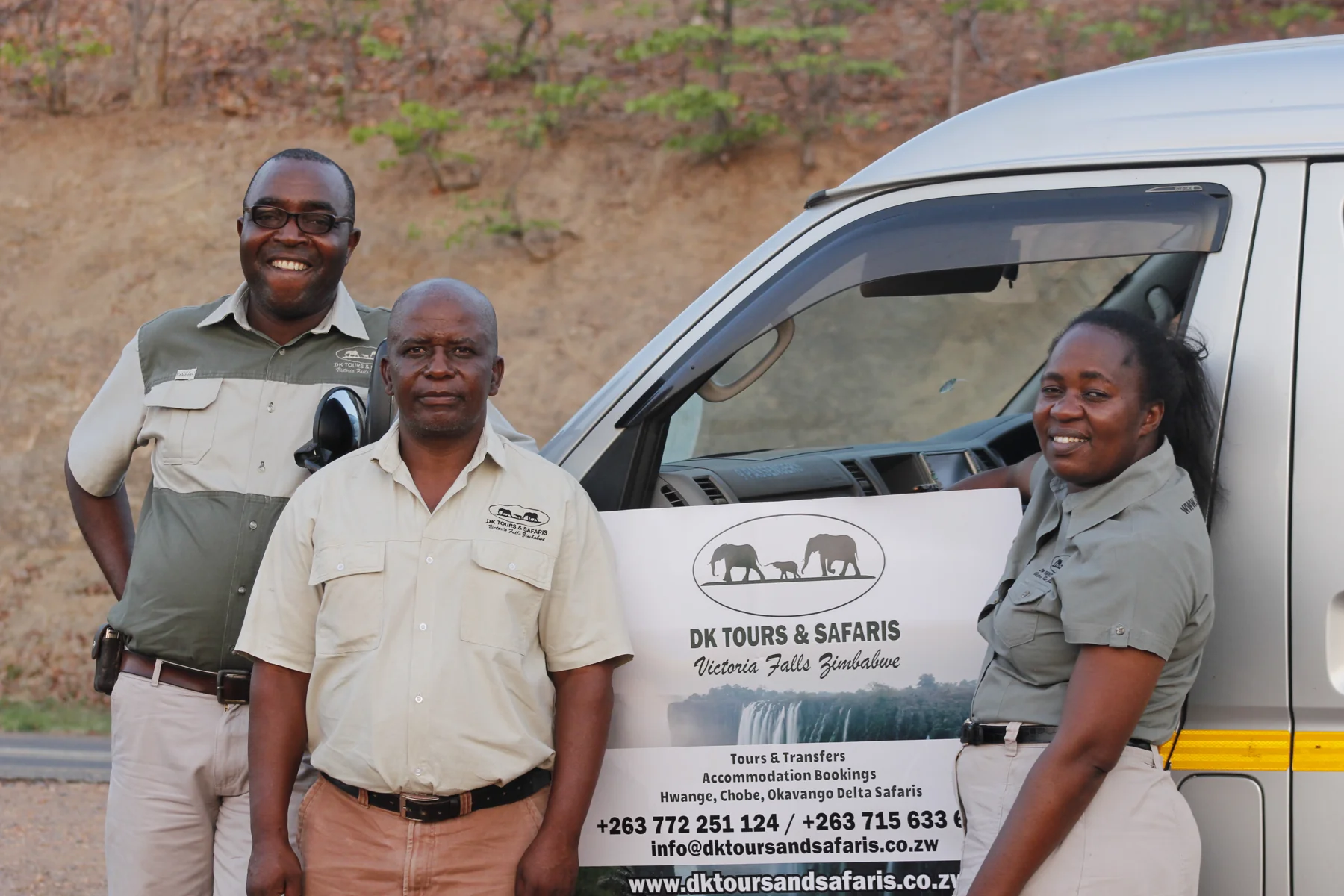 DK Tours team beside a company transfer vehicle