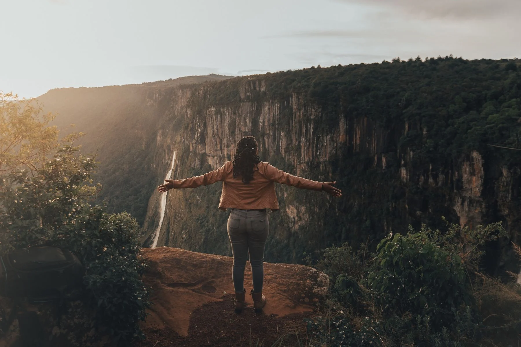 A visitor overlooking Mutarazi Falls in the Eastern Highlands